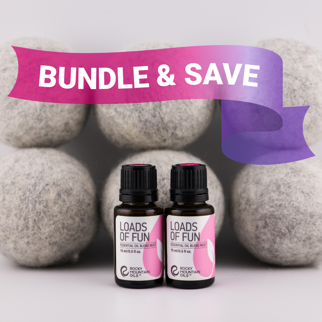 Two bottles of 'Loads of Fun' essential oil blend with a bundle of organic wool dryer balls, displayed with a 'BUNDLE & SAVE' banner.