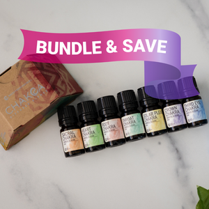 A set of seven small bottles of essential oil blends, each labeled with different names, arranged in a row in front of a box labeled 'Chakra'. There is a promotional banner saying 'BUNDLE & SAVE'.