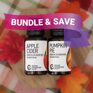 Two essential oil bottles labeled 'Apple Cider' and 'Pumpkin Pie' with a 'Bundle & Save' banner on a floral background.